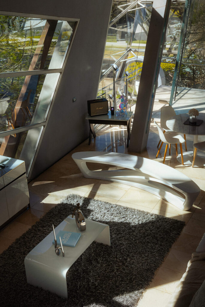 Terrace deck and glass railing overlooking the gardens