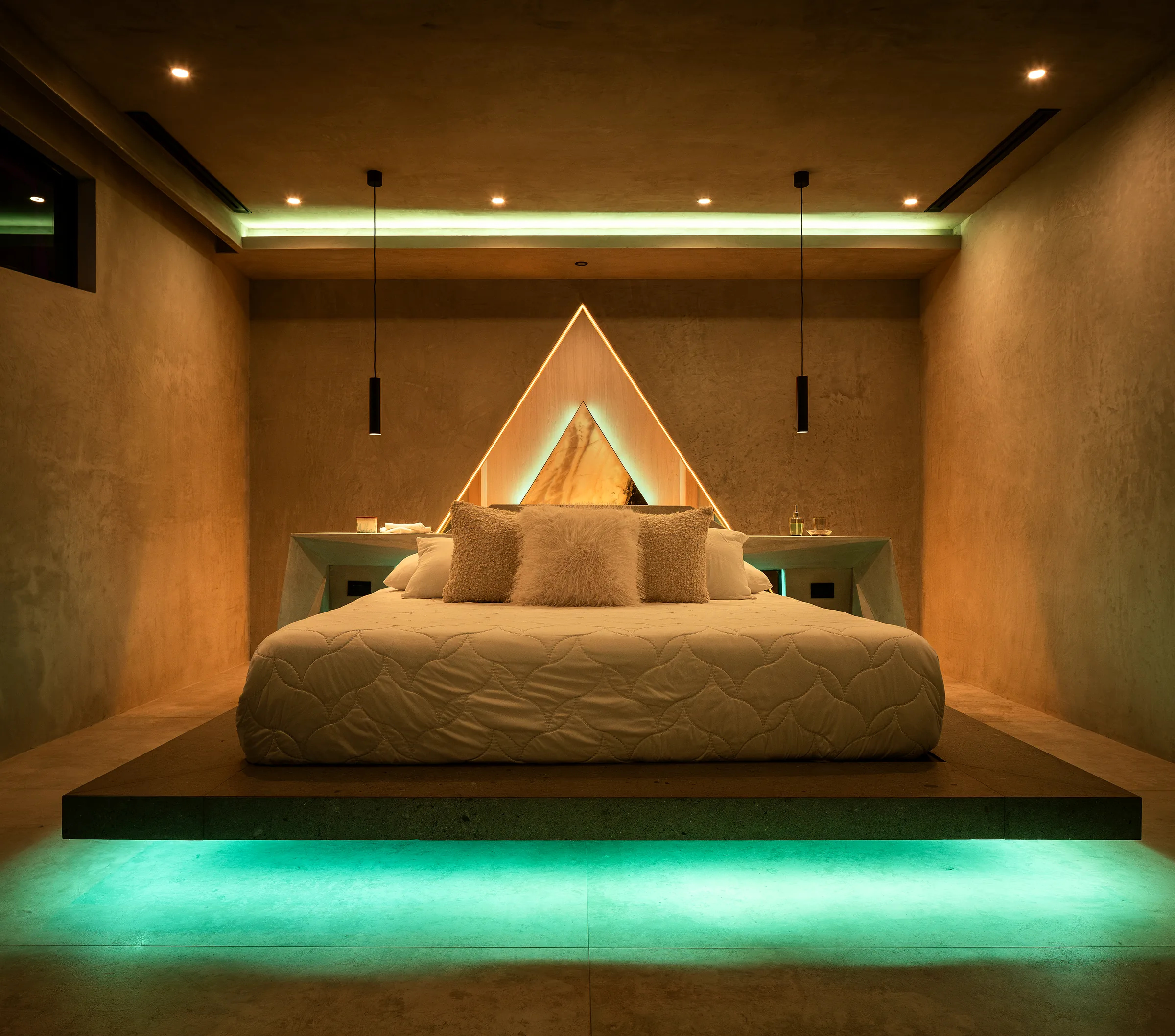 Water Cube bedroom with teal under-bed lighting and warm wood ceiling