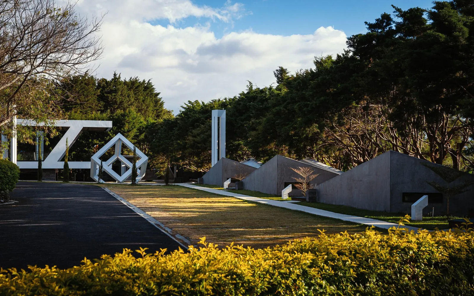 The Nebulae Cube sculpture standing on the grounds