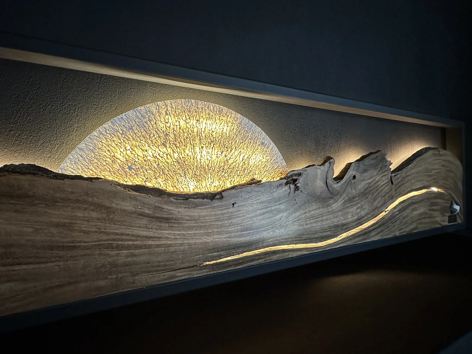 Horizonte seen at an angle, the grain flowing like hills under a glowing sun